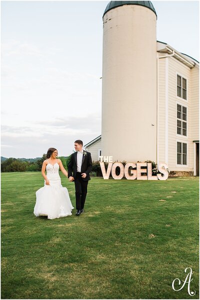 married couple outside barn wedding venue knoxville