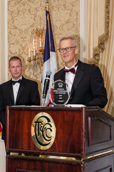 speaker during awards ceremony by Atlanta event photographer Laure Photography