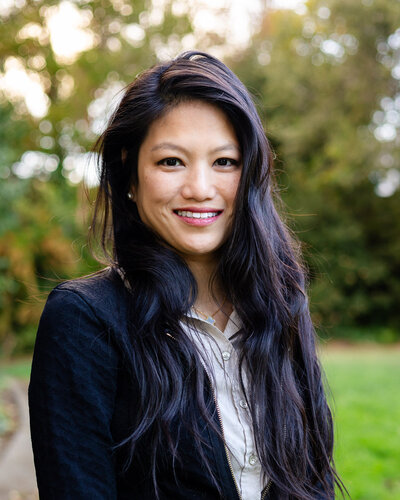 Confident professional headshot with long black hair outdoors – Bay Area Headshot Portfolio – Ellobelle Photography