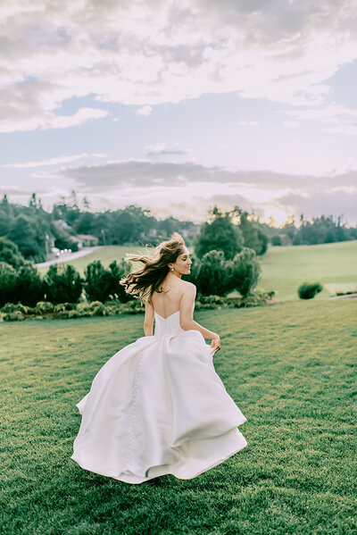 Bride runs through North Carolina field