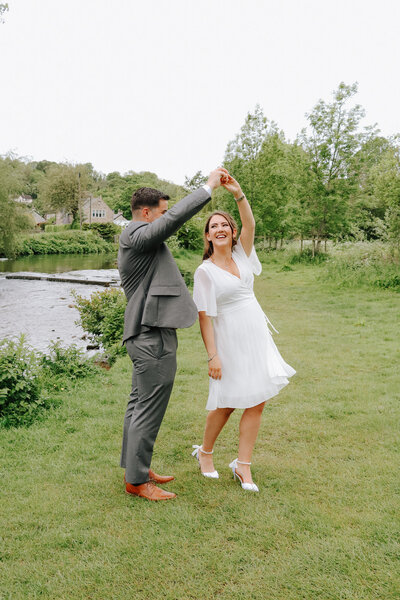 Candid wedding portrait in Bakewell town centre after registry ceremony