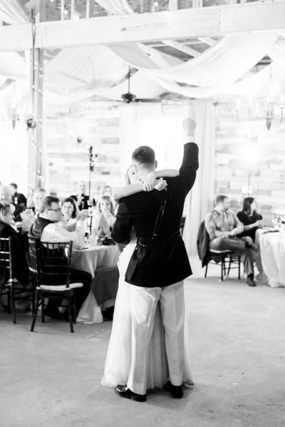 Groom with his fist in the air excited to have married his best friend