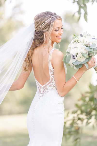 bright light and airy wedding photo of bride
