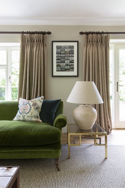 green velvet sofa and table lamo in cheltenham  living room