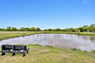This serene fishing pond is just a short walk from our 3-bedroom, 2.5 bathroom rural vacation rental house just minutes outside of downtown Waco, TX.