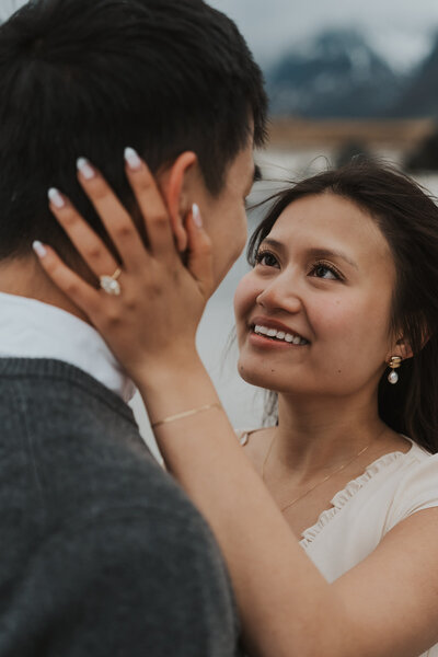 Bride looking into her grooms eyes in Lofoten