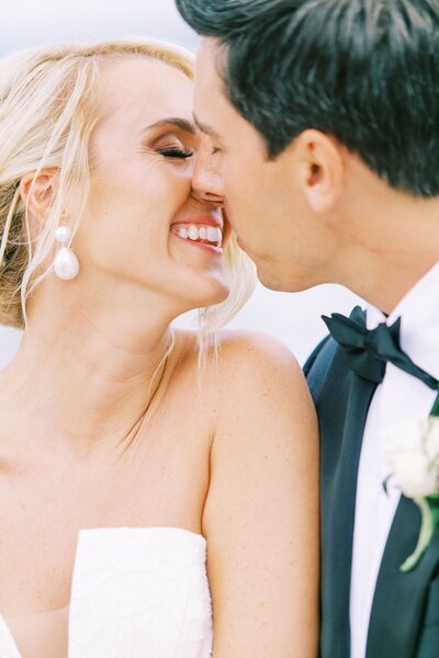 Bride and groom kissing