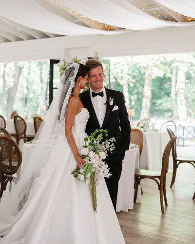 Bride and groom sharing a quiet, intimate moment at their Greencrest Manor wedding in Michigan