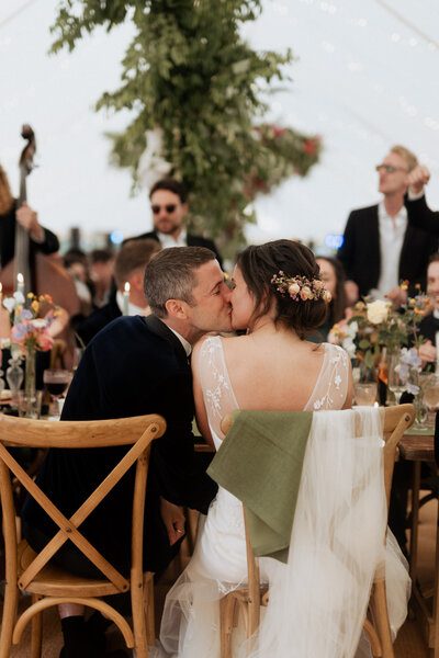 bride and groom kissing