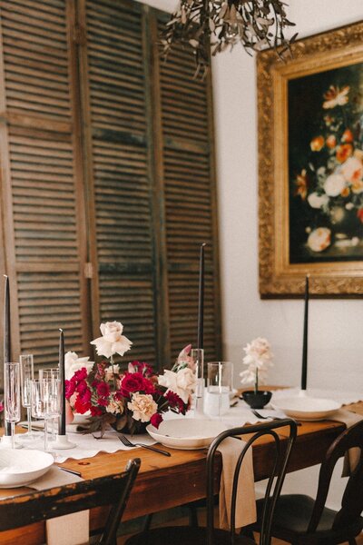 Detail shot of Austin and Chris’s wedding table setting in Richmond, Virginia, captured in editorial style with film-inspired color tones.