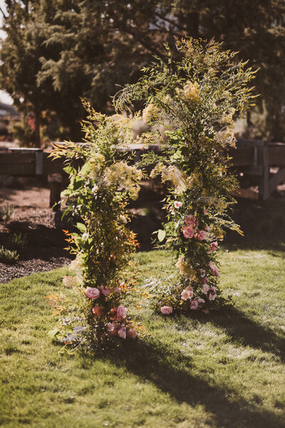 Asymmetrical Lush Wedding Ceremony Floral Arch