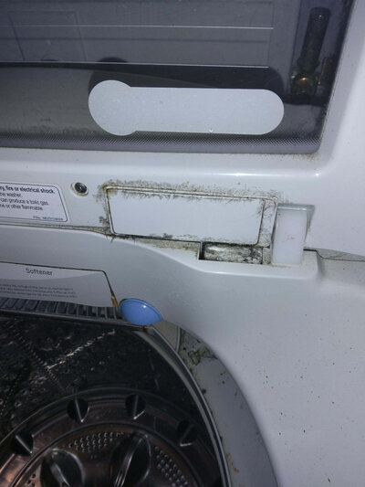 dirty laundry machine Rocket City Clean Up Crew LLC Logo