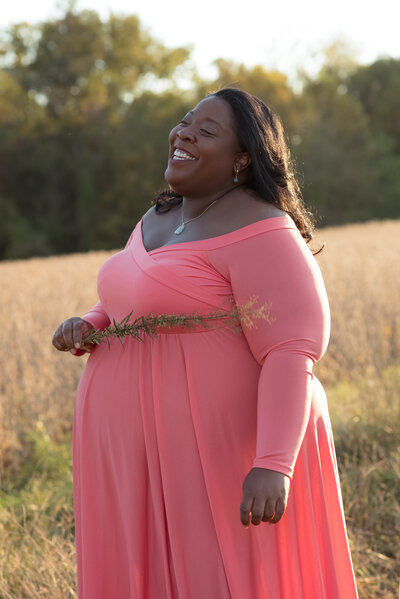 Photo of lady in pink dress located in Maryland Field