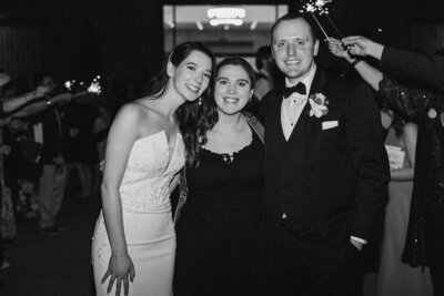 Olivia rose with bride and groom
