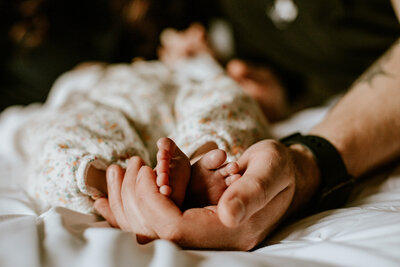 A cozy newborn photo session at client's home in Charleswood in Winnipeg