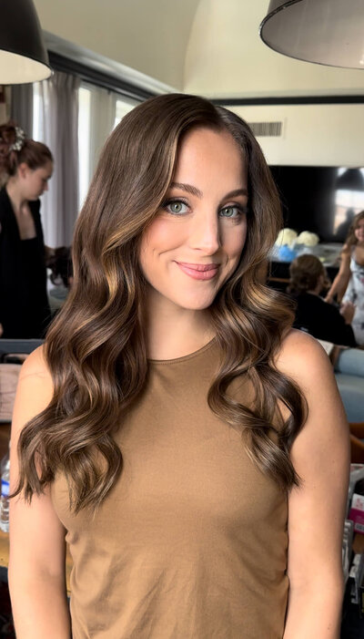 Bridesmaid with soft, flowing waves — simple and effortless wedding day hair styled by Klover Beauty in Maryland.