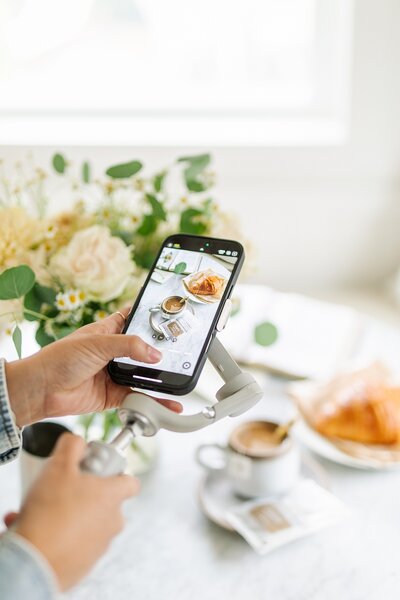 Bride and groom sharing champagne for engagement session.