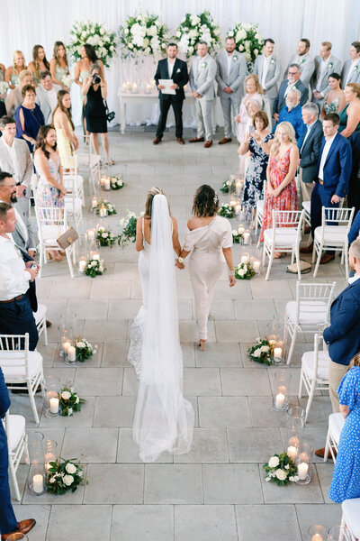 Bride and groom walk up memorial steps at their DC wedding