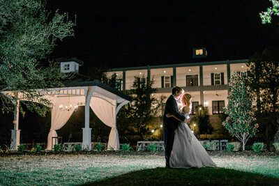 Bride and groom pose  by the Kendall Point gazebo ,  the centerpiece of our San Antonio wedding venue