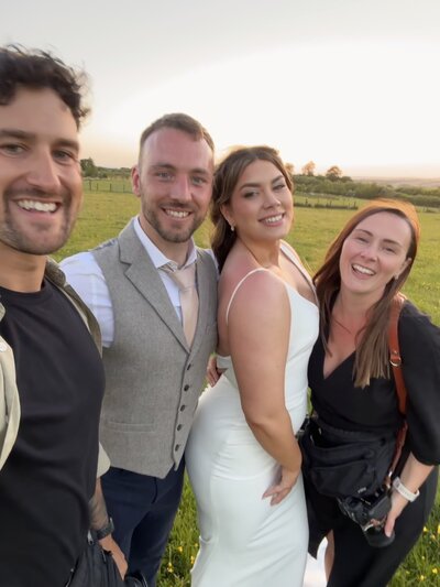 Amy & Nick posing with couple