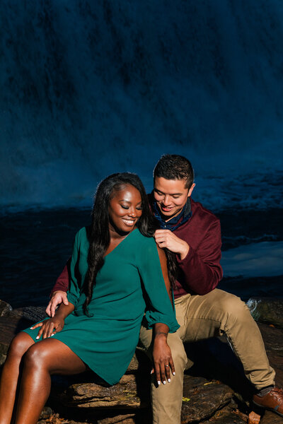 Mixed racial couple at their night time engagement session in Roswell taken by a Wedding Photographer in Atlanta
