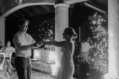 bride and groom dancing at wedding