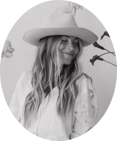 Black and white headshot of floral designer, Annalee, of floral design studio Flowerlee Design