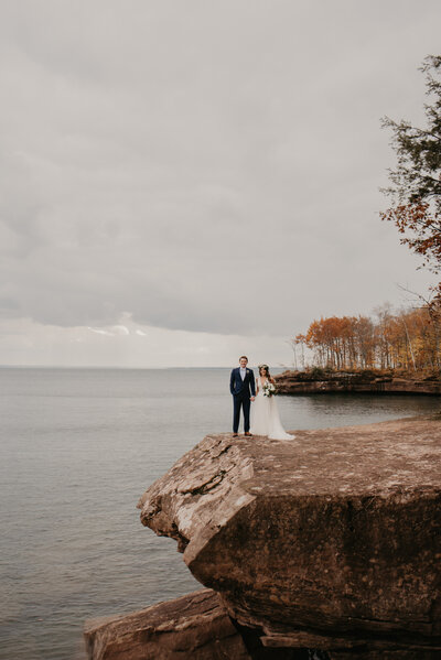 bride and groom smiling and looking at each other