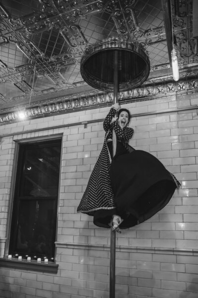 Bride slides down the fire pole at The Firehouse Chicago