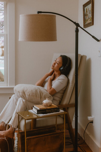 lifestyle  portrait of wellness coach in a recliner