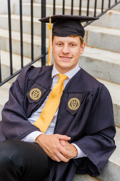 Spring outdoor urban boy senior portraits Georgia tech Graduation with Atlanta photographer Laure photography