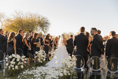 couple embraces for engagement photos in arizona
