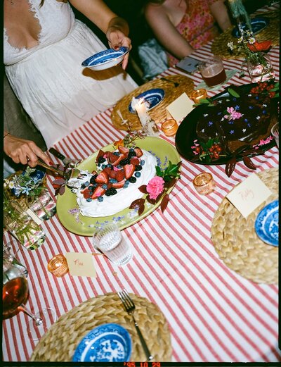 Guests gather around a scenic outdoor tablescape for a farm-to-table dinner event hosted by Farm Dinner LA