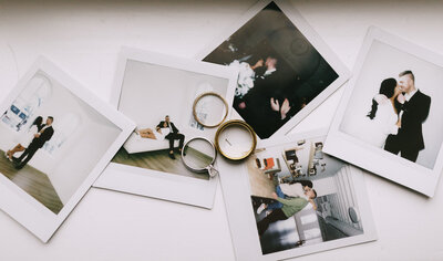 Polaroids of Toledo Wedding photos lay on a white background