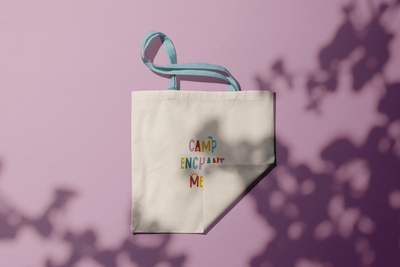 artful camp enchantment nonprofit logo on canvas bag merch