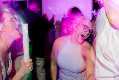 Bridesmaid dancing during the wedding reception at Ashton Gardens Atlanta