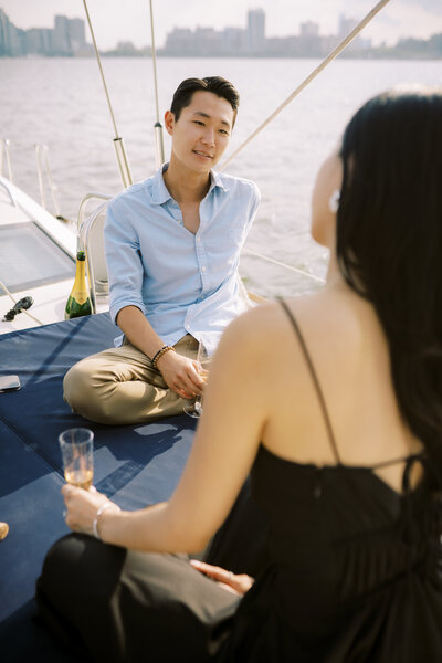 Couple's engagement on a boat