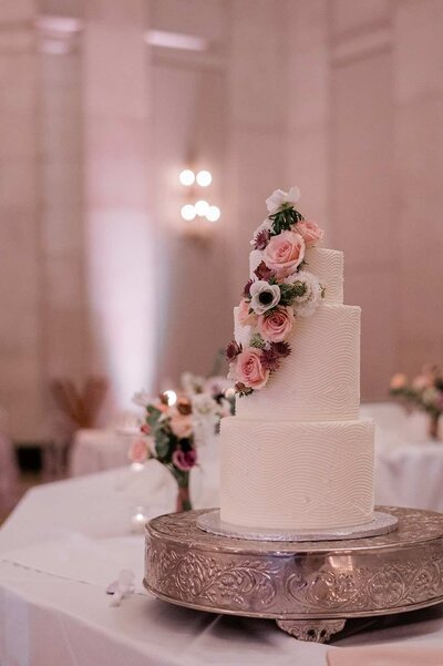 Three tiered wedding cake at the Hall of Springs