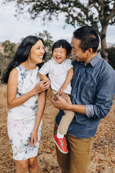 Family all smiles together during family photo session in Walnut Creek, CA