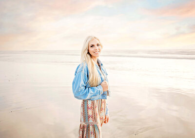 Encinitas  senior photographer features a photo of a graduate on the beach in Carlsbad