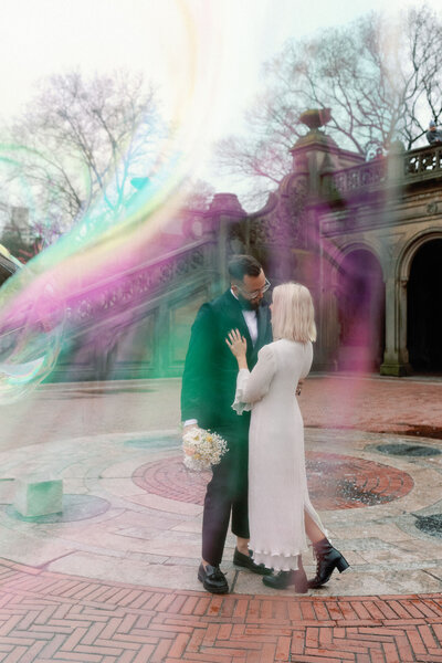 Central Park elopement bethesda terrace couple with bubble