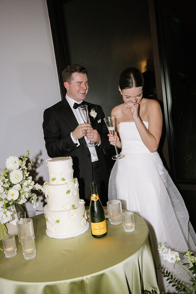 Bride and groom cutting cake at The Grand Lady Austin planned by Bianca Nichole and Co