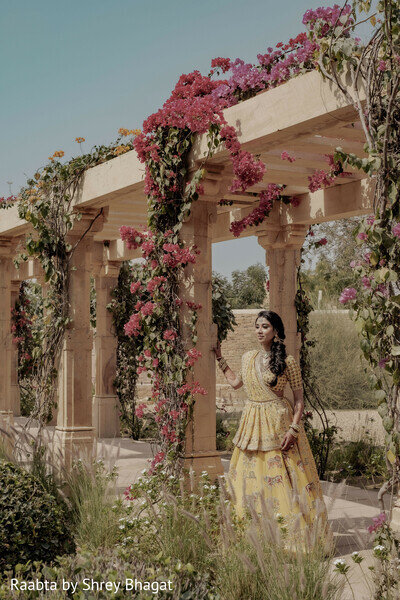 Bride in beautiful wedding courtyard