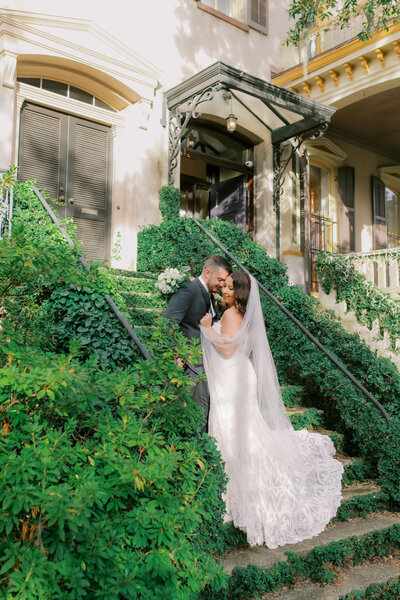 An elegant elopement portrait session for the newlyweds at Wormsloe, capturing the joy of their special day