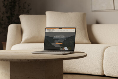 A website mockup showcasing custom web design for a rustic and mountain themed wedding venue