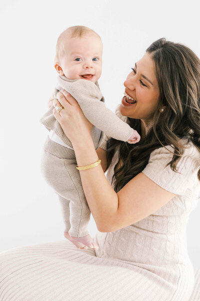 pregnant mom with kids and husband in raleigh studio
