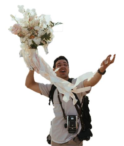 man holding a wedding bouquet