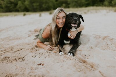 Kristina and her dog posing for the camera