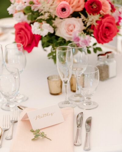 Tented blush place card with gold calligraphy for wedding at Wadsworth Mansion in Connecticut