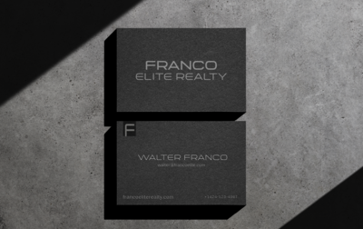 custom black business cards  with franco elite realty embossed on front and walter franco realtor on back